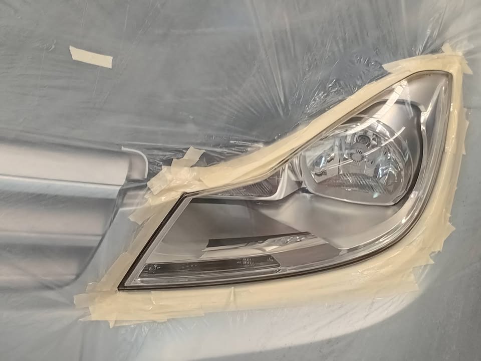 Headlight masked and prepared for the HBC-System 2K restoration process - 09 July 2026 SMART Repair